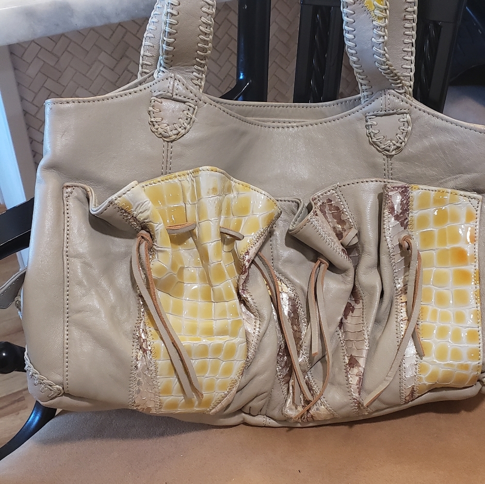 Chi Falchi Designer leather handbag.